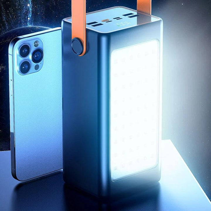 Powerbank med LED-belysning bredvid iPhone