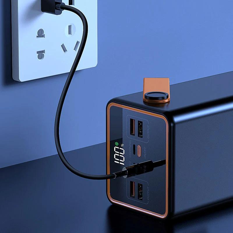 Powerbank ansluten till vägguttag för uppladdning
